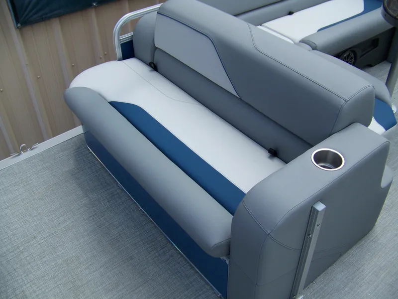 Slide: The Image of 2025 Avalon VENTURE 85 Cruise Rear Bench with gray and blue upholstery, featuring a cup holder. - 13