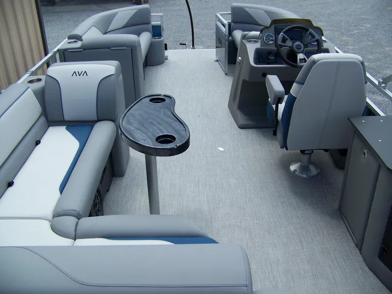 Slide: The Image of 2025 Avalon VENTURE 85 Cruise Rear Bench interior with plush seating and modern helm. - 14