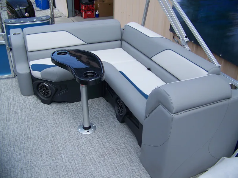 Slide: The Image of 2025 Avalon VENTURE 85 Cruise Rear Bench with sleek seating and modern table design. - 7