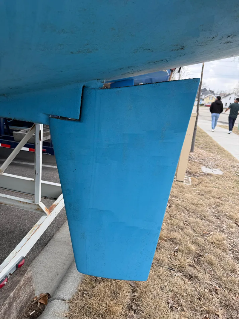Slide: The Image of Close-up of a 1998 Catalina 28 MkII sailboat keel on a trailer. - 4