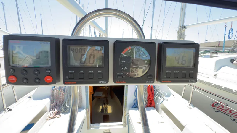 Slide: The Image of Cockpit instruments on a 1998 Catalina 28 MkII sailboat, displaying speed and wind data. - 9