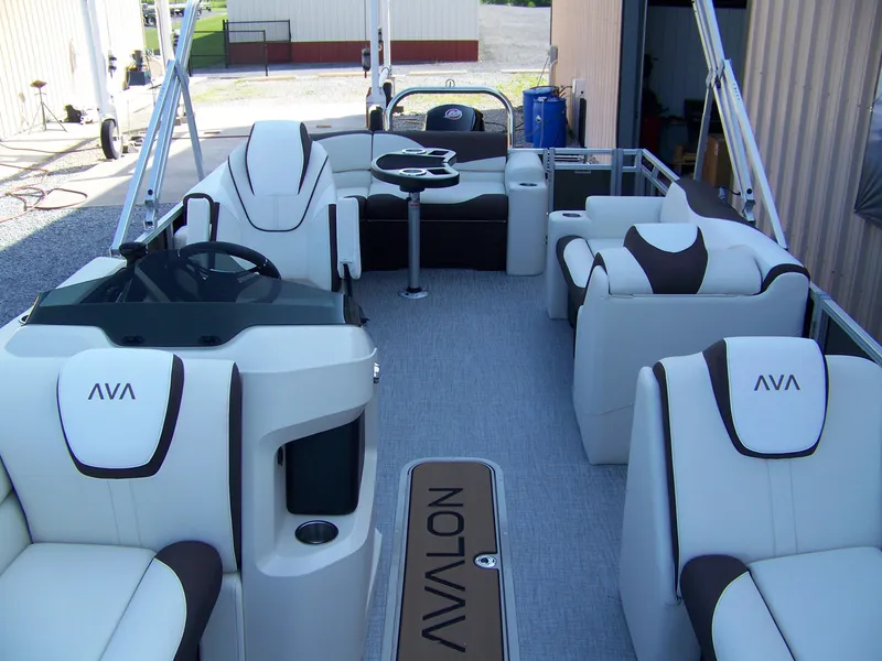 Slide: The Image of Luxurious 2025 Avalon LSZ ELITE pontoon boat interior with plush seating and modern design. - 4