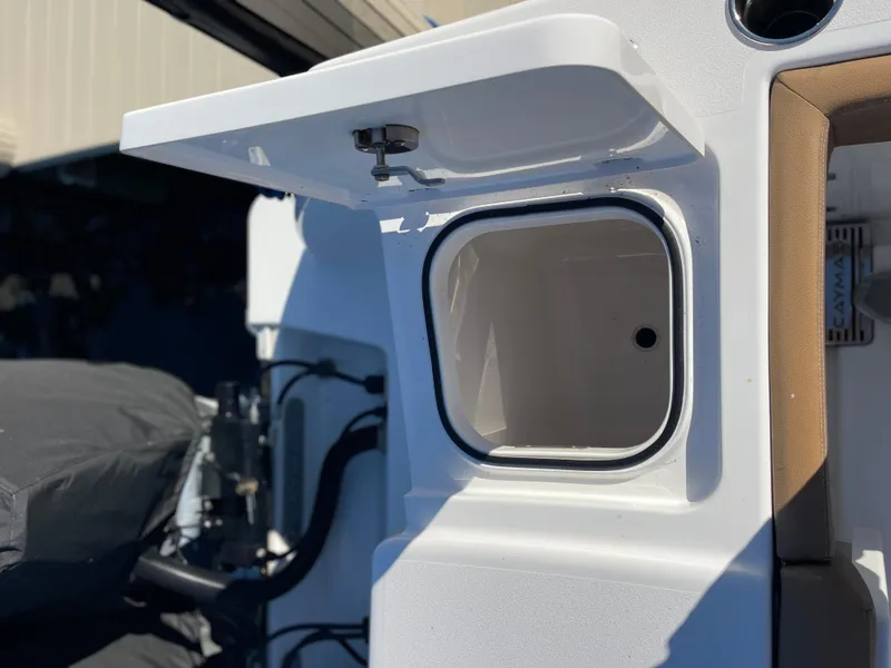 Slide: The Image of 2022 Caymas 341 CC boat compartment detail with open hatch. - 15