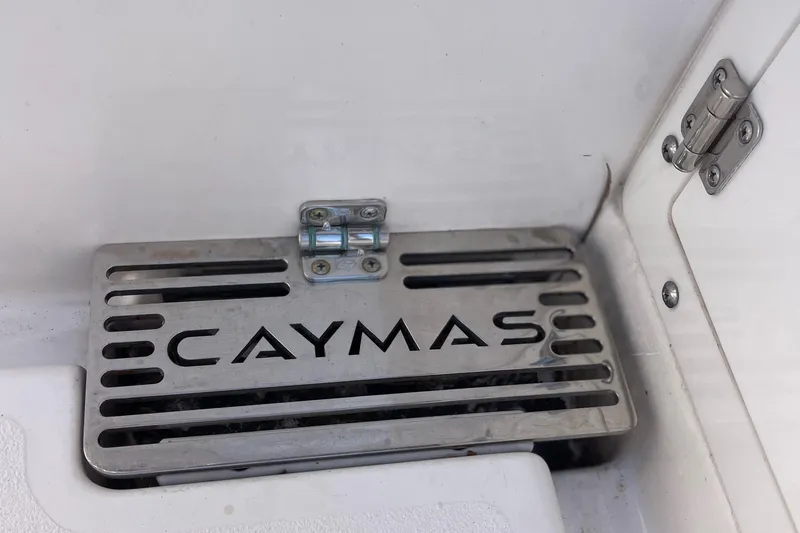 Slide: The Image of Caymas 341 CC 2022 boat detail with branded metal vent cover. - 17