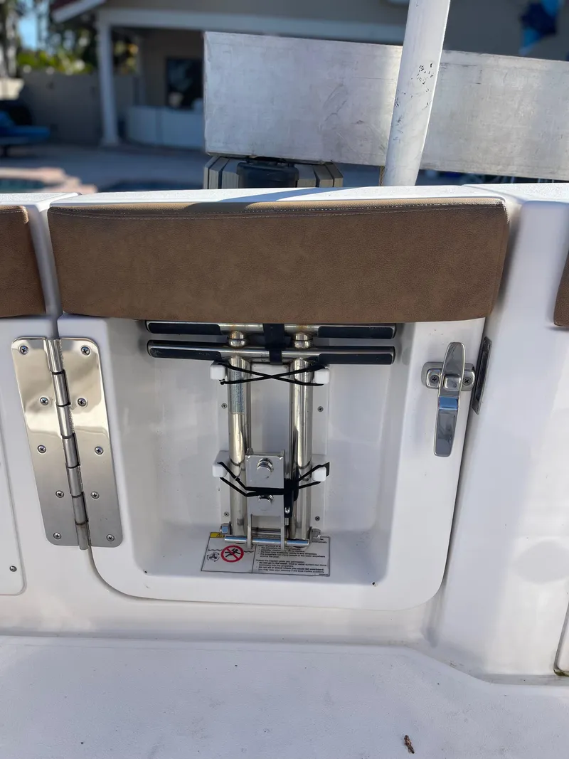 Slide: The Image of 2022 Caymas 341 CC boat detail showing a hatch with mechanical components. - 18