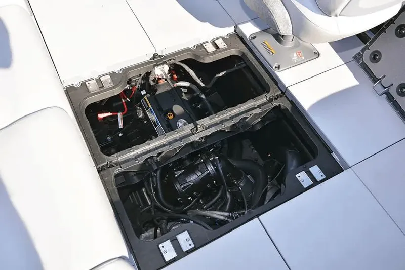 Slide: The Image of 2024 Sea-Doo Switch® Cruise 18 engine compartment, showcasing internal components and wiring. - 6