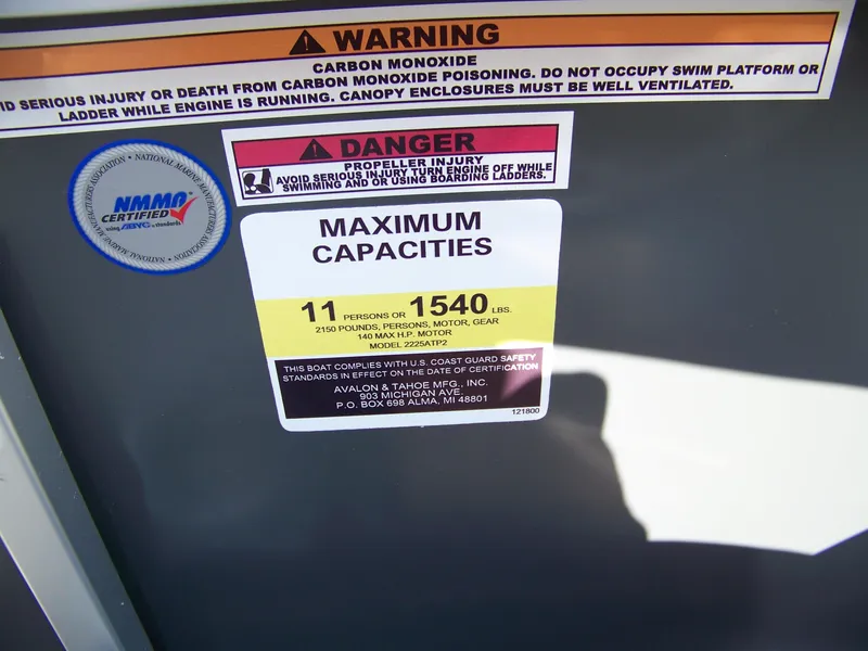 Slide: The Image of Warning label on Avalon VENTURE CRUISE 2025, indicating maximum capacity and safety instructions. - 11