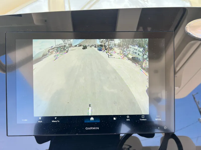 Slide: The Image of Garmin display on 2025 Scout 357 LXF showing rearview camera footage. - 12