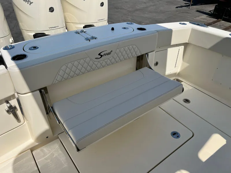 Slide: The Image of 2025 Scout 357 LXF boat interior with foldable seat and elegant design. - 7
