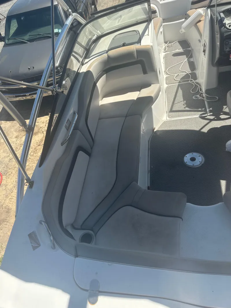 Slide: The Image of 2010 Yamaha Boats 212SS interior with spacious seating and modern design. - 19