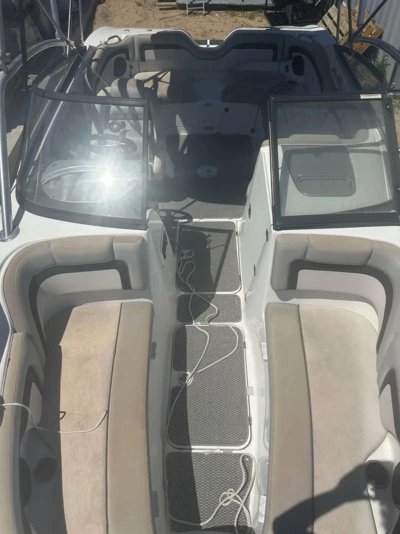 Slide: The Image of 2010 Yamaha Boats 212SS interior with seating and open deck layout. - 8
