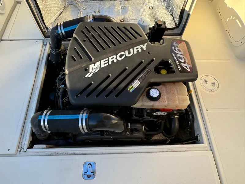 Slide: The Image of Mercury engine in a 2004 Limestone 24 Cuddy boat, showcasing its powerful design. - 21