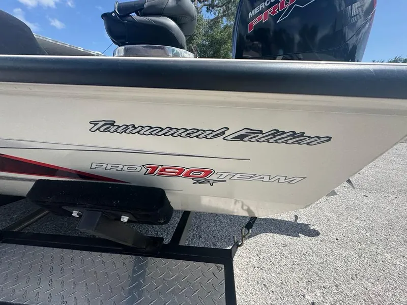 Slide: The Image of 2020 Tracker Pro Team 190 TX boat, Tournament Edition, parked on a trailer. - 4