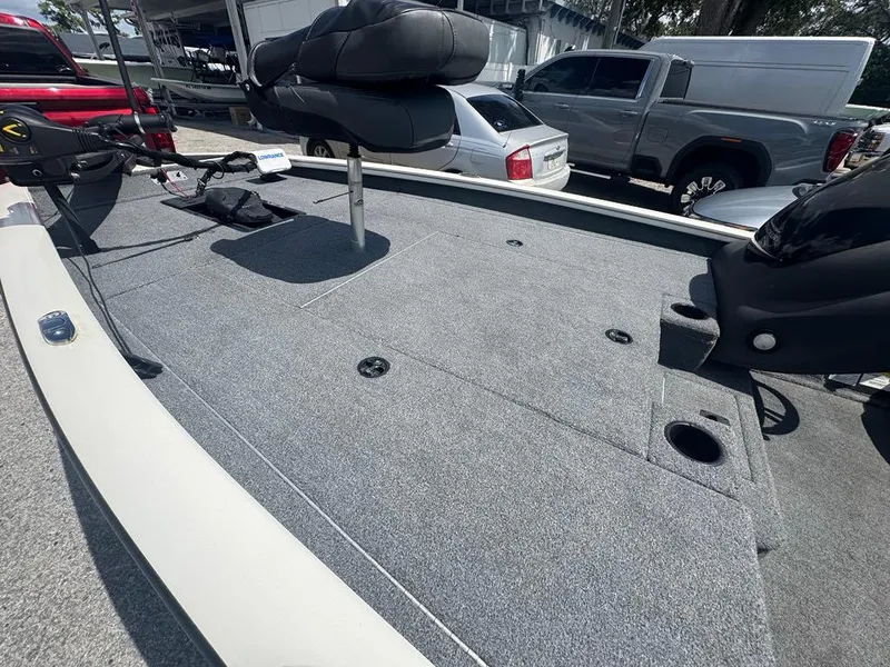 Slide: The Image of 2020 Tracker Pro Team 190 TX boat deck with seating and storage compartments. - 5