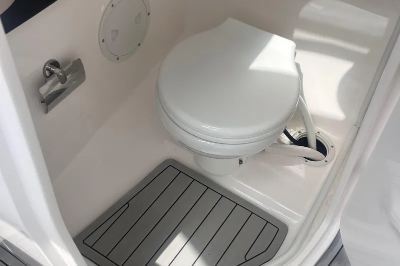 Slide: The Image of Modern boat toilet in a 2025 Ventura Comfort model, featuring sleek design and compact space. - 10