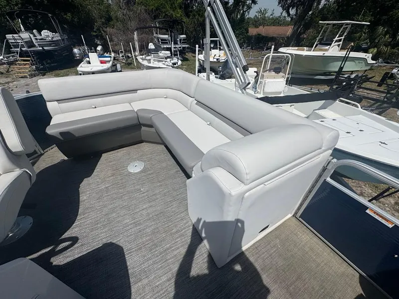 Slide: The Image of Pontoon boat interior with gray seating, Sweetwater 1880 CX, 2021 model. - 4