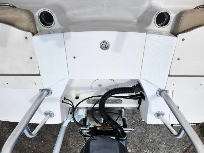 Slide: The Image of 2018 Robalo R180 Center Console boat stern with engine and ladder. - 10