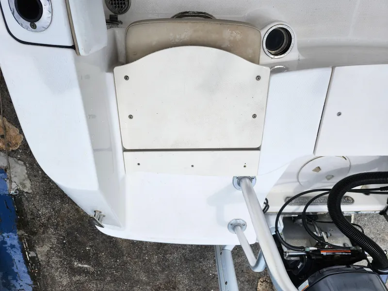 Slide: The Image of 2018 Robalo R180 Center Console boat deck with ladder and fittings. - 12