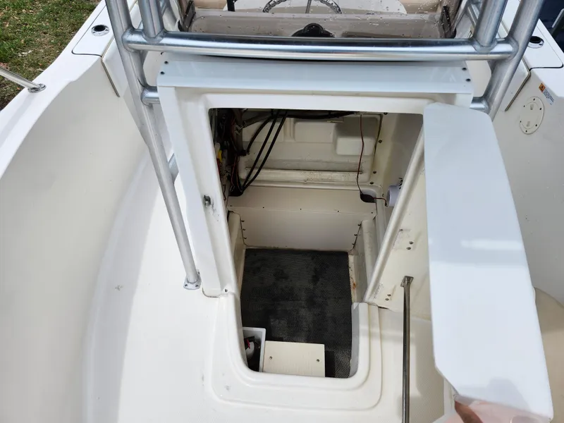 Slide: The Image of 2018 Robalo R180 Center Console boat interior storage compartment. - 23