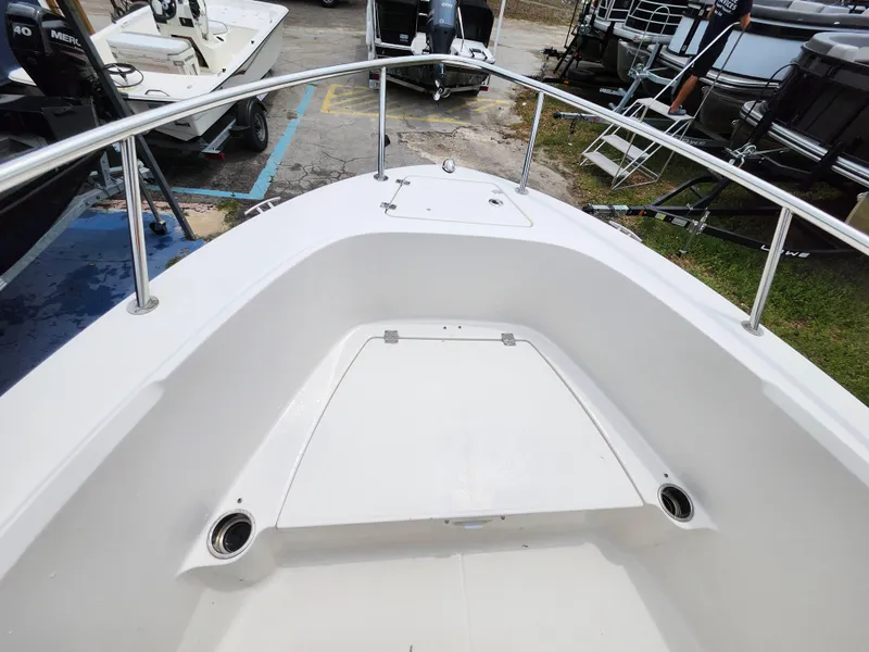 Slide: The Image of 2018 Robalo R180 Center Console boat deck with stainless steel railings. - 24