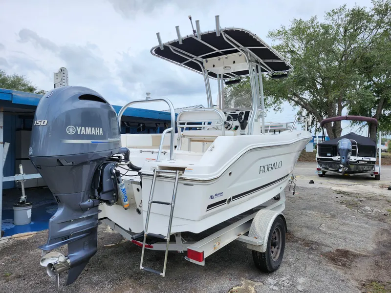 Slide: The Image of 2018 Robalo R180 Center Console boat with Yamaha engine on trailer. - 6