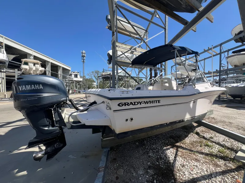 Slide: The Image of 2006 Grady-White Freedom 225 boat with Yamaha outboard motor in storage facility. - 3