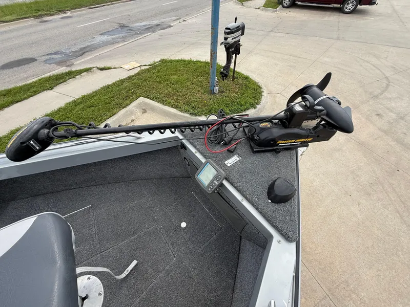 Slide: The Image of 2002 Lund 1800 Fisherman boat with trolling motor and fish finder on deck. - 9