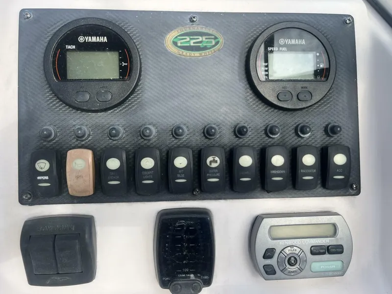 Slide: The Image of Control panel of a 2008 Grady-White 225 Tournament boat with Yamaha gauges. - 12