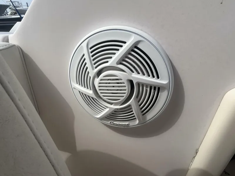 Slide: The Image of Boat speaker on 2008 Grady-White 225 Tournament, featuring a white circular design. - 16