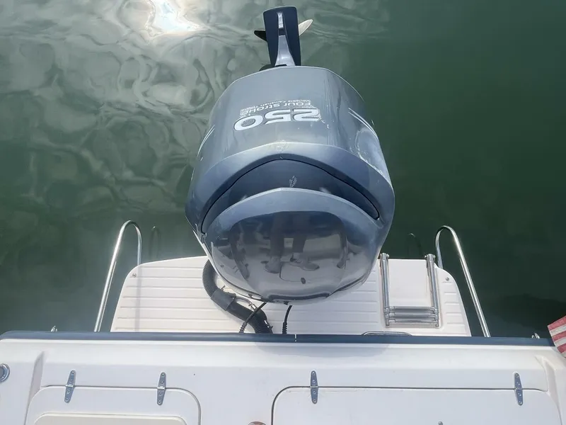 Slide: The Image of 2008 Grady-White 225 Tournament boat with Yamaha 250 outboard motor on water. - 27