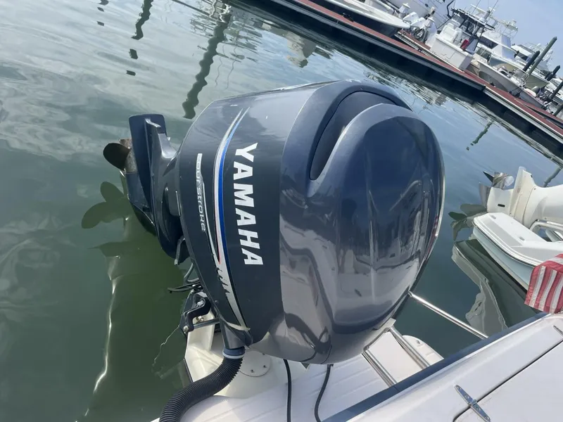 Slide: The Image of Yamaha outboard motor on 2008 Grady-White 225 Tournament boat at marina. - 28