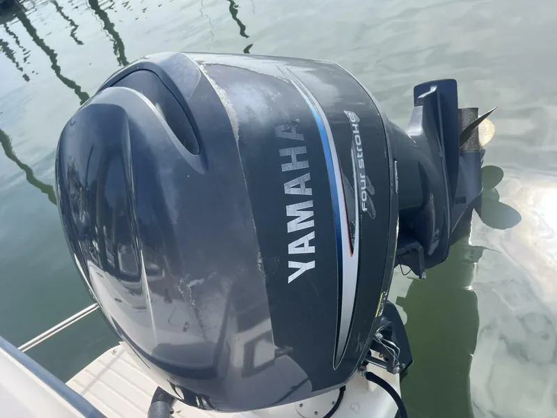 Slide: The Image of Yamaha outboard motor on 2008 Grady-White 225 Tournament boat in water. - 29