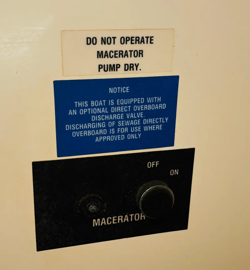 Slide: The Image of Control panel for macerator pump on 1989 Sea Ray Sundancer boat. - 16