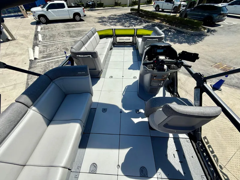 Slide: The Image of 2024 Sea-Doo Switch® Cruise 21 interior with spacious seating and modern controls. - 10