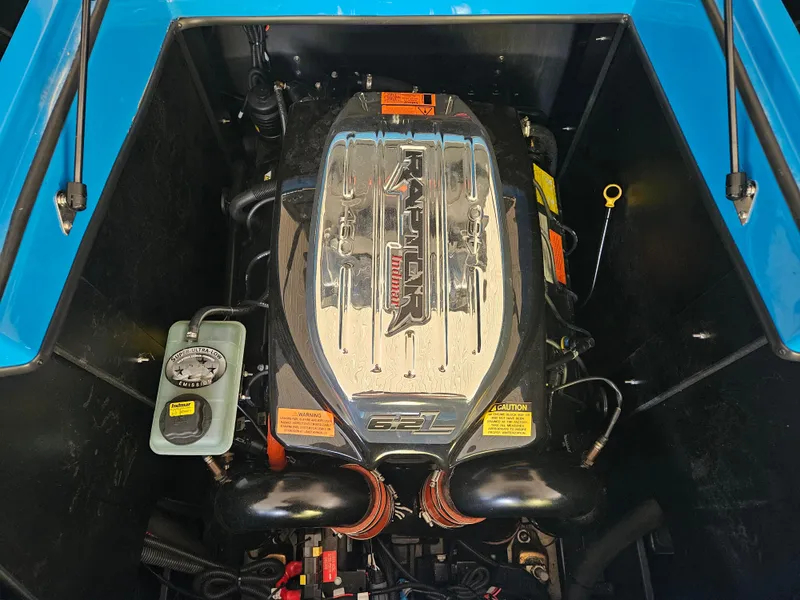 Slide: The Image of 2020 Tigé ZX25 engine compartment with Raptor motor, showcasing performance components. - 6