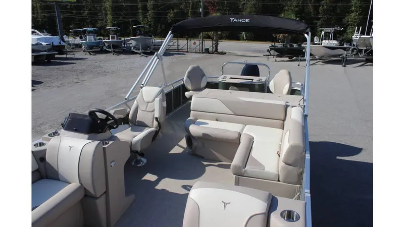 Slide: The Image of 2025 Tahoe Sport 85 Rear Fish 23 SW pontoon boat with spacious seating and modern design. - 16