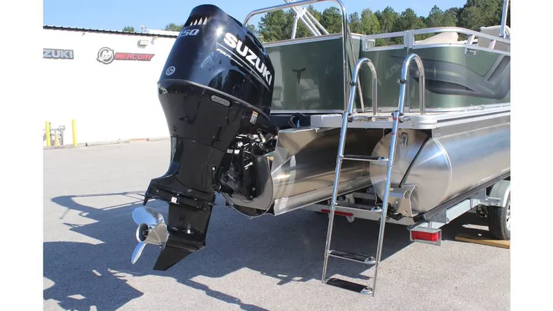 Slide: The Image of 2025 Tahoe Sport 85 Rear Fish 23 SW with Suzuki outboard motor and ladder. - 6
