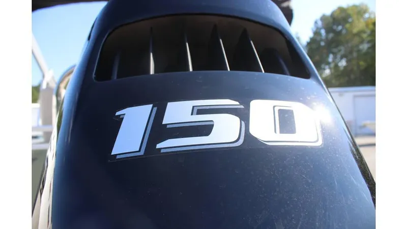 Slide: The Image of 2025 Tahoe Sport 85 Rear Fish 23 SW outboard motor with "150" decal. - 8