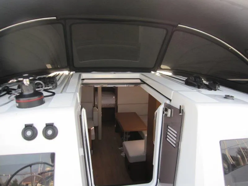 Slide: The Image of 2024 Jeanneau Sun Odyssey 410 yacht interior view, showcasing modern design and spacious cabin. - 26