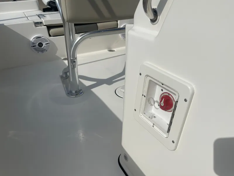 Slide: The Image of 2025 Key West 179 FS boat interior with seating and control panel. - 29