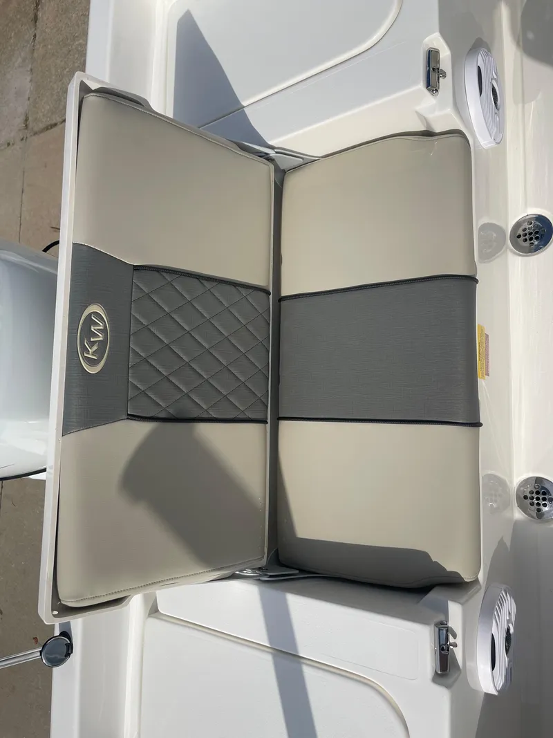 Slide: The Image of 2025 Key West 179 FS boat seat with gray and beige upholstery. - 34