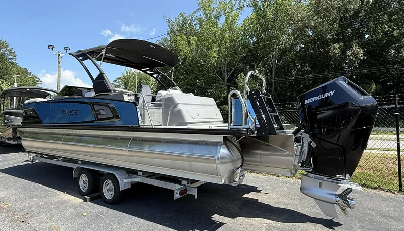 Slide: The Image of 2025 Tahoe Pontoon Grand Tahoe Elite Windshield on trailer, featuring Mercury outboard motor. - 3