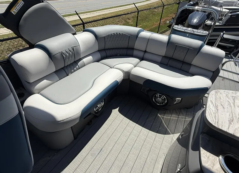 Slide: The Image of Luxurious seating on 2025 Tahoe Pontoon Grand Tahoe Elite Windshield boat, featuring plush upholstery. - 8