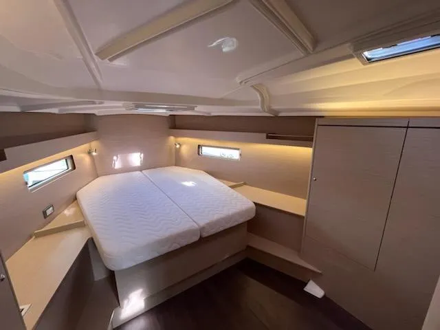 Slide: The Image of 2023 Beneteau Oceanis 40.1 cabin interior with double bed and modern design. - 15