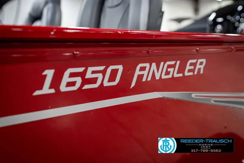 Slide: The Image of Red 2021 Lund 1650 ANG SS boat with "1650 Angler" text on the side. - 42