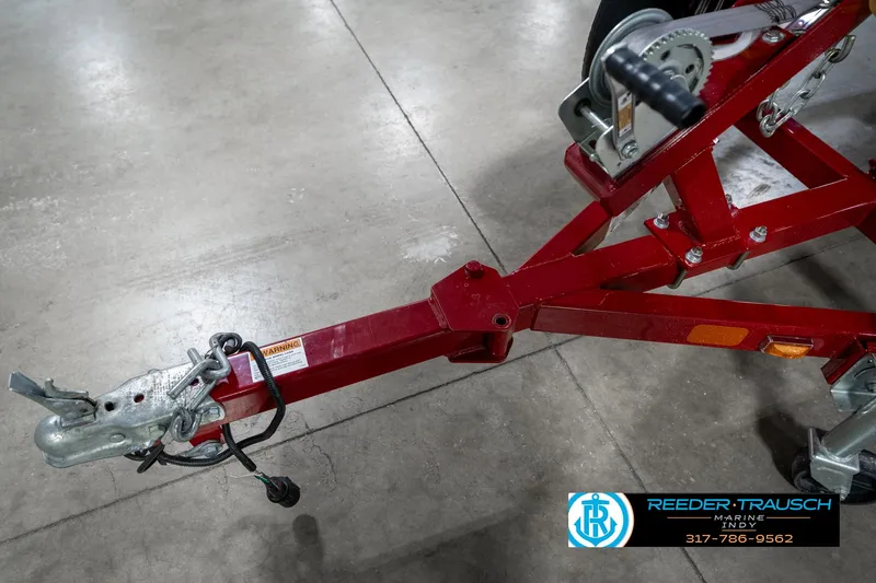 Slide: The Image of Red trailer hitch for 2021 Lund 1650 ANG SS boat on concrete floor. - 45