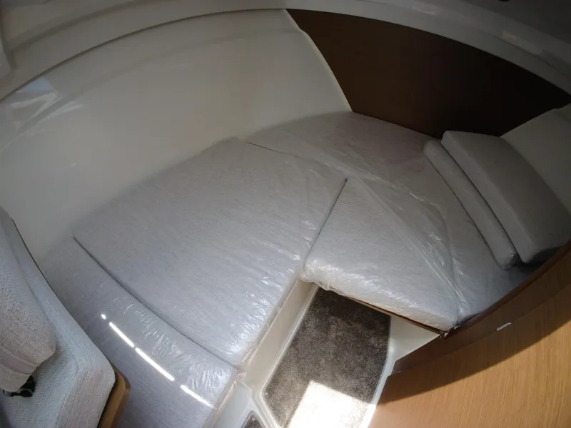 Slide: The Image of Electrical components inside a 2022 Jeanneau NC 695 Series 2 boat. - 13