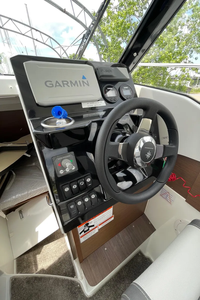 Slide: The Image of 2022 Jeanneau NC 695 Series 2 helm with Garmin navigation system. - 6