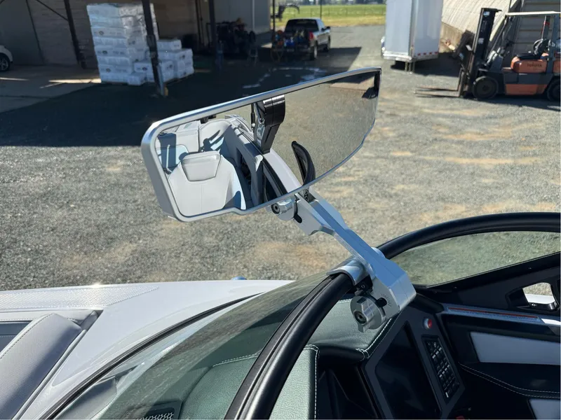 Slide: The Image of 2024 MasterCraft XStar S boat rearview mirror, showcasing sleek design and modern features. - 17