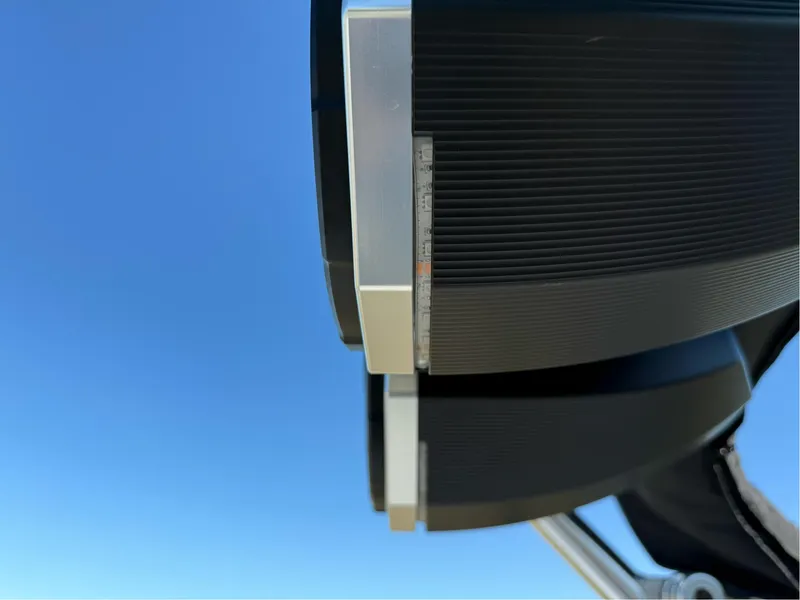 Slide: The Image of Close-up of 2024 MasterCraft XStar S boat detail against clear blue sky. - 42